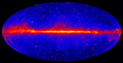 This view shows the entire sky in gammy ray radiation, at energies greater than 1 GeV, based on five years of data from the Large Area Telescope instrument on NASA's Fermi Gamma-ray Space Telescope. Brighter colours indicate brighter gamma-ray emission. The large bright band in the middle is the emission from our own Galaxy.