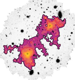 The image shows the diffuse gas (yellow to purple) contained within the cosmic filament connecting two galaxies (yellow stars), extending across a vast distance of 3 million light-years.